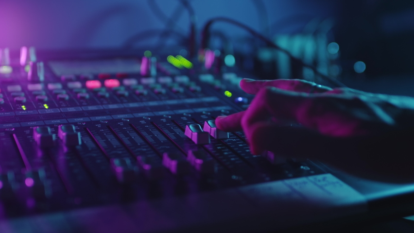 Soundboard Pads On TV Station.Sound Designer Used Digital Audio Mixer In Production Studio.Sound Engineer Moving Sliders In Radio Station.Engineer Press Key Buttons On Control Desk Recording Studio | Shutterstock HD Video #1060714840