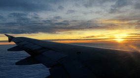 Footage of aerial view of cloud sky form window plane. Cinematic Natural real landscape footage. The most beautiful “sunset” scene.