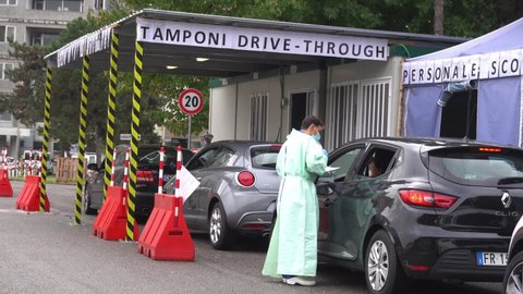 Europe, Italy , Milan October 2020, People are tested at a drive thru, Coronavirus pandemic, covid-19. Blood test and swab nasal test during quarantine home lockdown in San Carlo Hospital, people mask