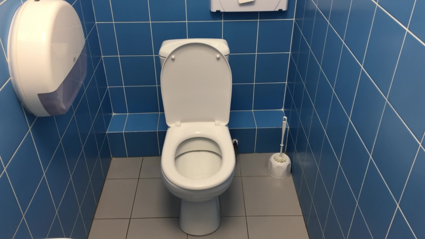 toilet room in blue interior. bathroom design restroom public office wc Royalty-Free Stock Footage #1060736647