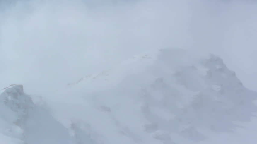 Strong winds in the mountains of snow takes to the skies Royalty-Free Stock Footage #10607369