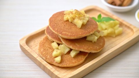 apple pancake or apple crepe with cinnamon powder