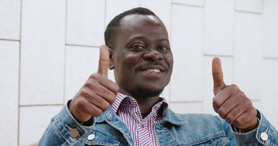 Happy African man talking to the camera handsome young African man video call to business parterner