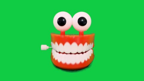 Crazy wind-up teeth chattering and clattering in a funny and humorous way.