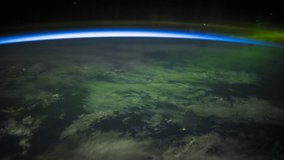ISS Time-lapse Video of Earth seen from the International Space Station with dark sky and Aurora Borealis at night over Alberta to Quebec Canada, Time Lapse Full 4K UHD. Images courtesy of NASA.
