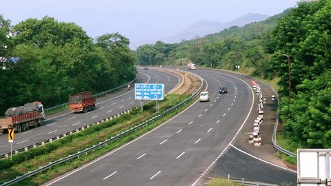 Pune, India -  October 18 2020: The Mumbai-Pune Expressway after the monsoon season near Pune India. The Expressway is officially called the Yashvantrao Chavan Expressway.