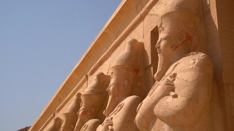 Sculptures of Pharaohs at the entrance on floor three of Hatshepsut's Funerary Temple in Luxor, Egypt.