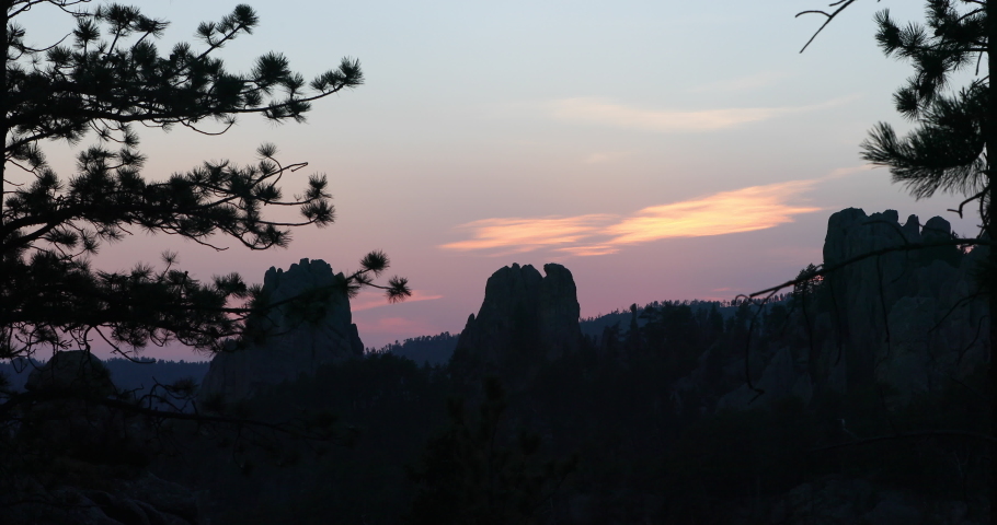 Sunset rock towers pine tree Custer South Dakota 4K. Black Hills of South Dakota. Mountain, valley, landscape scenic discovery. State Park with wildlife, lakes, campgrounds and picnic areas. 
