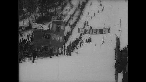 1940s: Skiers in Winter Olympic slalom competition.