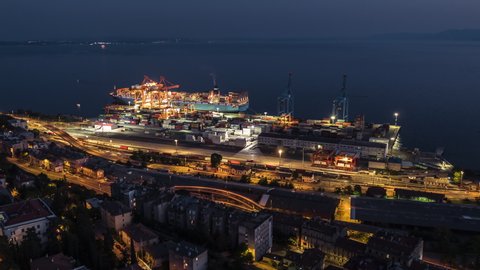 Establishing Aerial View Shot of Rijeka, Port of Rijeka, Croatia at night evening