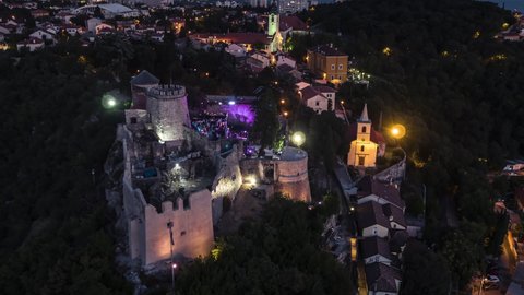 Establishing Aerial View Shot of Rijeka, Rijeka Castle, Croatia at night evening