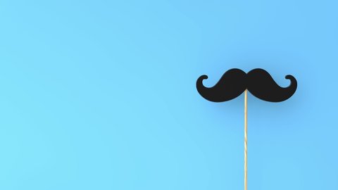 moustache on a blue background. Father's day or mens health concept