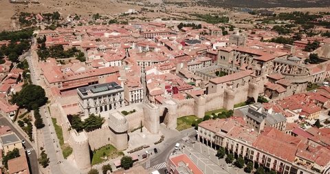 Aerial view of cityscape of fortified city of Avila with its town walls and ancient Cathedral of Saviour, Spain
