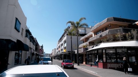 BONDI BEACH, AUSTRALIA - AUGUST 2018: City streets on a beautiful sunny day. Slow motion