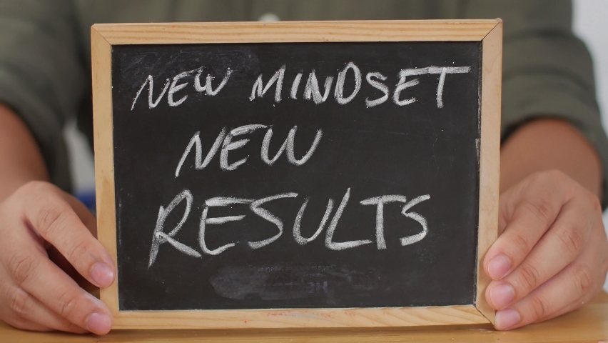 New Mindset new result. Male writing on chalkboard. Motivational inspirational self development quote text typography concept Royalty-Free Stock Footage #1060834876