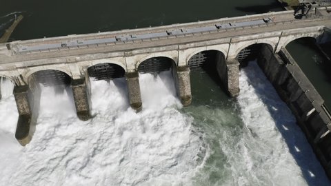 Aerial view of a dam on river Adda and hydroelectric power station, Italy