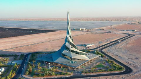 Aerial top view of Solar innovation centre futuristic building in Dubai desert next to solar farm - Dubai, UAE - Sep 2020