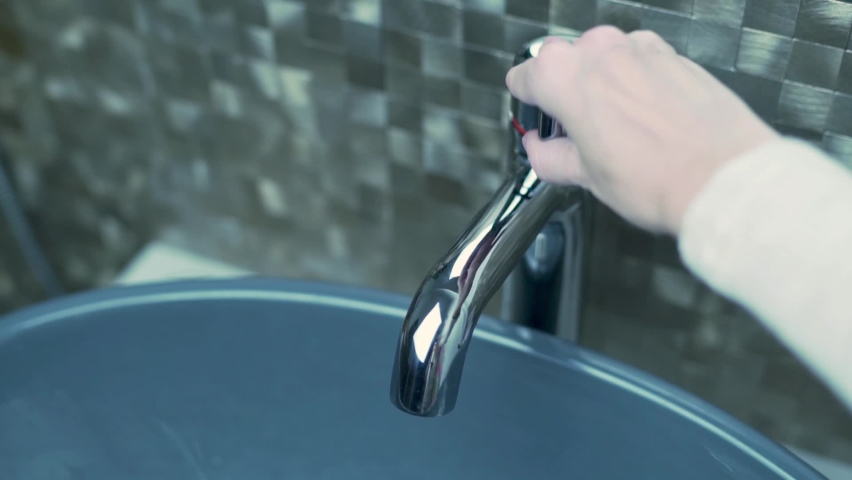 girl opens faucet modern bathroom turns Stock Footage Video (100% Royalty-free) 1060854295 | Shutterstock