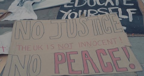 Bristol, UK - June 07 2020: Signs at the base of the Edward Colston statue, after Black Lives Matter Protest