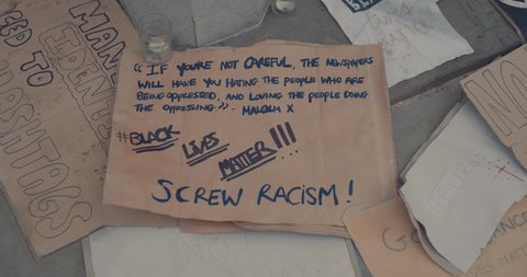 Bristol, UK - June 07 2020: Signs at the base of the Edward Colston statue, after Black Lives Matter Protest