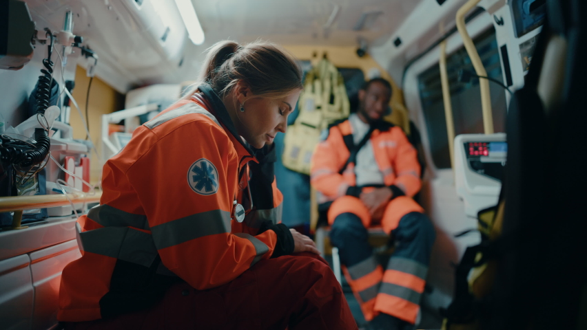 tired female ems professional paramedic tries Stock Footage Video (100% ...