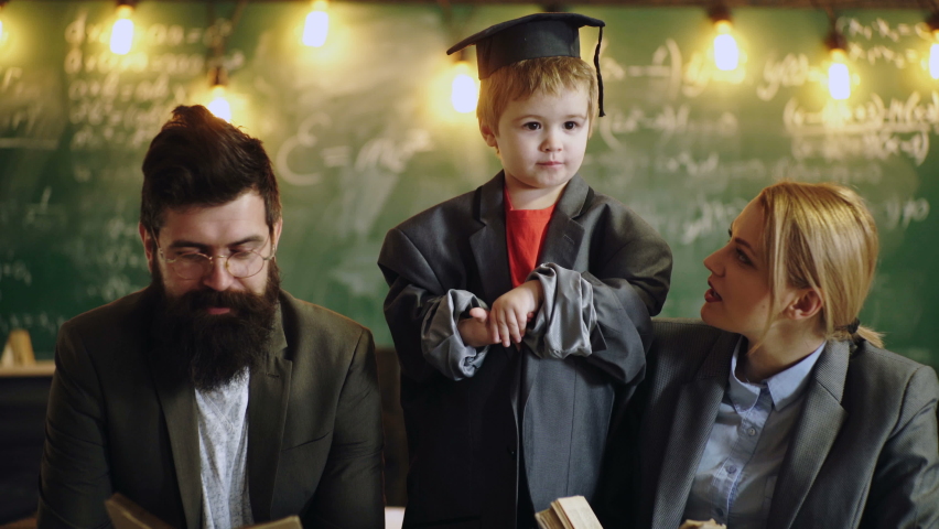 Father mother and son at school. Pupil with teachers in class Royalty-Free Stock Footage #1060863877