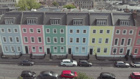 Row of multicoloured terraced houses in Bristol, England - Aerial drone shot 