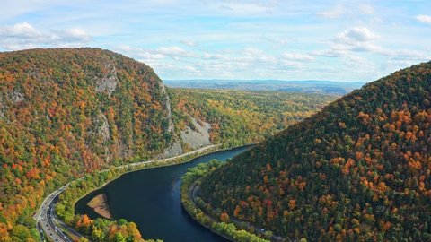 Aerial view of Delaware Water Gap on a sunny autumn day with forward camera motion. The Delaware Water Gap is a water gap on the border of the U.S. states of New Jersey and Pennsylvania - part 2