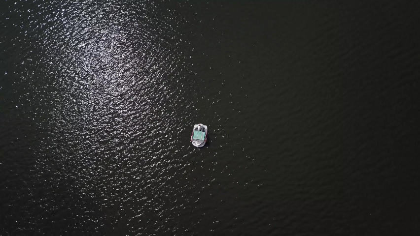 A drone footage of pedalo on the lake in Vietnam