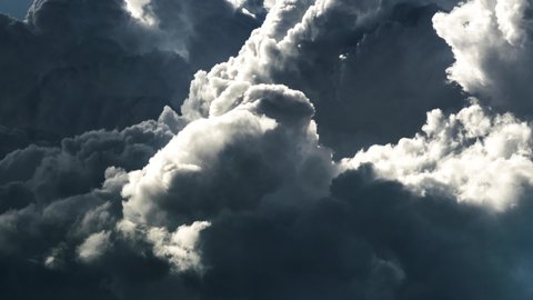 a thunderstorm inside a thick dark cloud, cumulus cloud