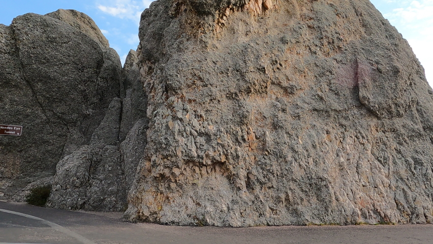 CUSTER, SOUTH DAKOTA - 25 SEP 2020: Needles Eye Tunnel Custer park South Dakota POV 4K. Black Hills of South Dakota. Mountain, valley, landscape scenic discovery. State Park with wildlife.