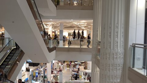 London. UK- 10.14.2020: a interior view of Selfridges department store showing the various floor levels reached by escalators.