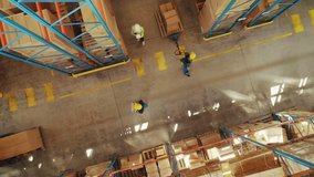 Top-Down View: In Warehouse People Working, Forklift Truck Operator Lifts Pallet with Cardboard Box. Logistics, Distribution Center with Products Ready for Global Shipment, Customer Delivery - Powered by Shutterstock - Get 15% off with code: PIKWIZARD15