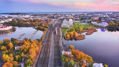 Aerial view of the railway in the center of Helsinki in Autumn evening. Amazing aerial hyperlapse video of Central Helsinki, Finland.