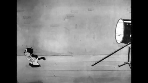 CIRCA 1936 - In this animated film, Beans kills a Frankenstein robot with a wind machine.