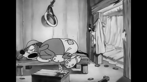 CIRCA 1931 - In this animated film Bosko is a soldier in WWI who helps his officer, a dog, scratch away fleas with a bullet-riddled helmet.