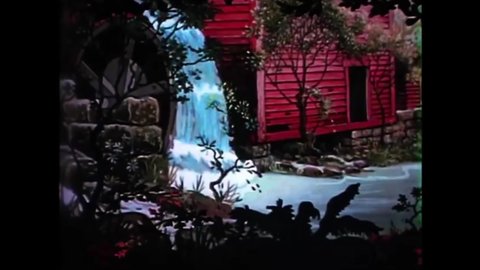 CIRCA 1938 - In this animated film, fishing rods are seen set up by a picturesque stream.