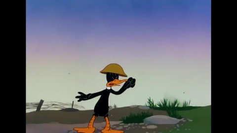 CIRCA 1943 - In this animated film, Daffy Duck is shot out of a cannon and hits Adolf Hitler in the middle of a speech.