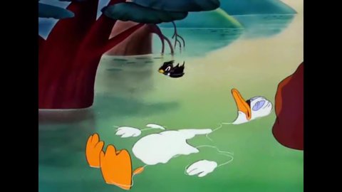 CIRCA 1943 - In this animated film, a black duckling saves baby swans from a vulture and is welcomed into the family.