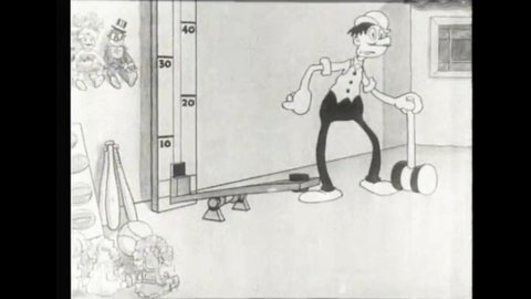 CIRCA 1933 - In this animated film, a boy is sad that his friend is better than him at carnival games.