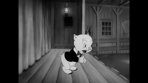 CIRCA 1941 - In this animated film, Porky Pig presents an animated film he made of a Al Jolson singing "September in the Rain" in blackface.