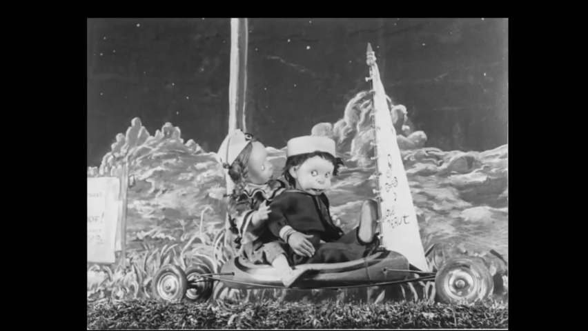 CIRCA 1930 - In this stop-motion animated film, a girl blows up a balloon that flies her past the moon until she is shot down.