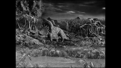 CIRCA 1925 - In this silent adventure movie, a Tyrannosaurus Rex kills a triceratops.