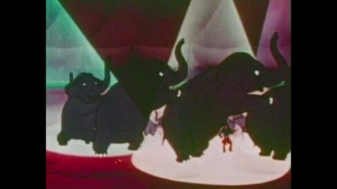 CIRCA 1948 - In this animated film, Tom Thumb watches elephants perform at a circus.