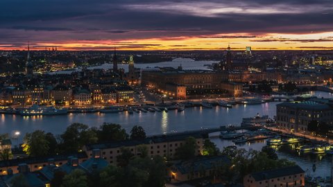 Establishing Aerial View Shot of Stockholm, Gamla Stan & Royal Palace, magical sunset, Sweden