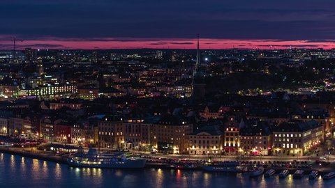 Aerial View Shot of Stockholm, Gamla Stan, City Hall, Amazing Red Sunset, Sweden charming evening