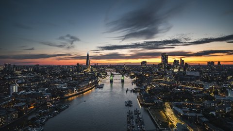 Establishing Shot of Royal Skyline,The City & Tower Bridge, Colorful Sunset, Aerial View Shot of London UK, United Kingdom