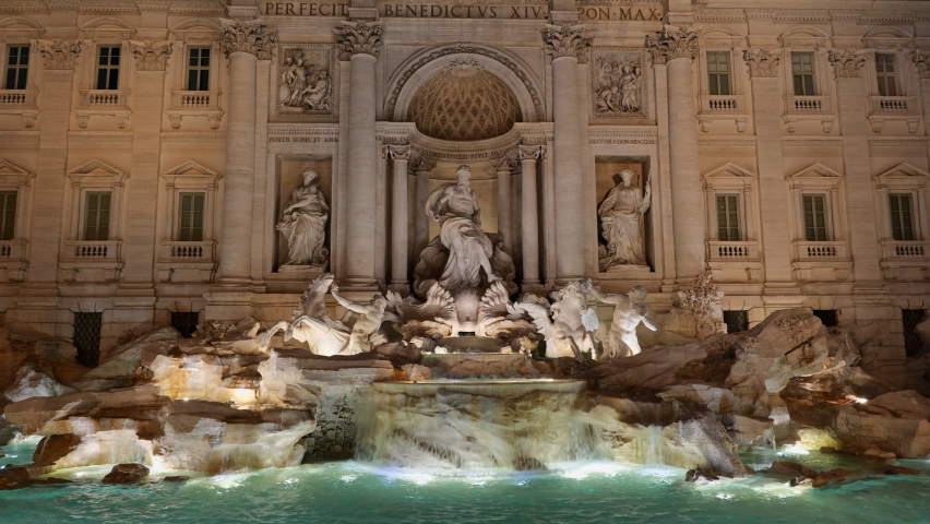 Trevi Fountain (Italian: Fontana di Trevi) at night in Rome, Italy, city landmark from 1762, one of the most famous Baroque fountains in the world. | Shutterstock HD Video #1060936120