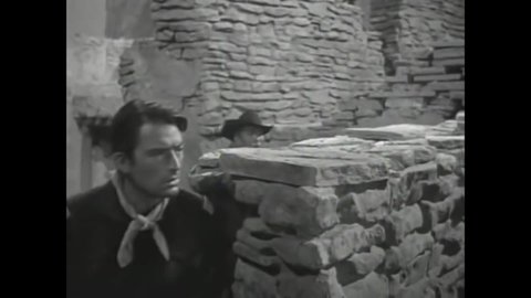 CIRCA 1951 - In this western film, a cavalry commander launches a defense against Native Americans who are attacking their fort in the daytime.