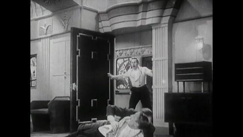 CIRCA 1930 - In this comedy movie, a drunk rich, athletic man (Douglas Fairbanks) runs around his mansion while his staff tries to stop him.